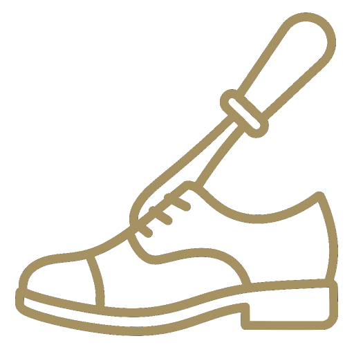 Outline of a shoe with a shoehorn on a white background